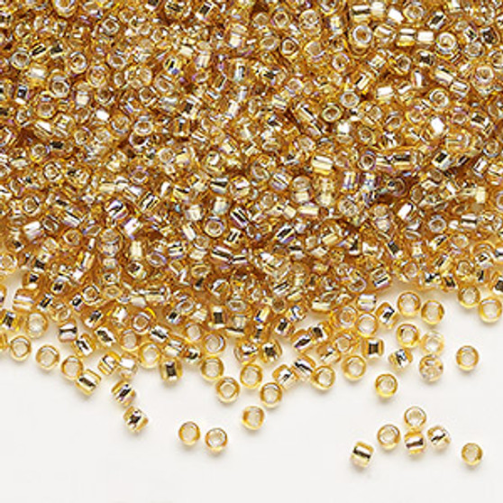 Seed bead, Dyna-Mites™, glass, silver-lined translucent rainbow gold, #11 round with square hole. Sold per 40-gram pkg.