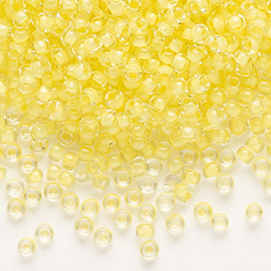 Seed bead, Dyna-Mites™, glass, translucent inside color yellow, #8 round. Sold per 40-gram pkg.