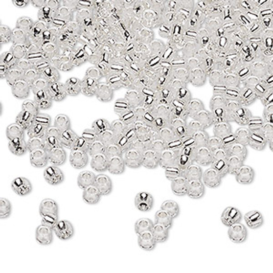 Seed bead, Dyna-Mites™, glass, silver-lined translucent clear, #8 round. Sold per 40-gram pkg.