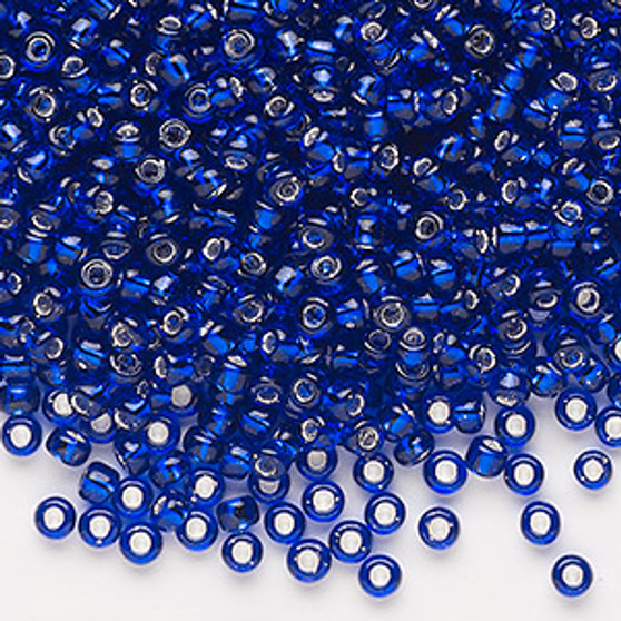 Seed bead, Dyna-Mites™, glass, silver-lined translucent cobalt, #8 round. Sold per 40-gram pkg.