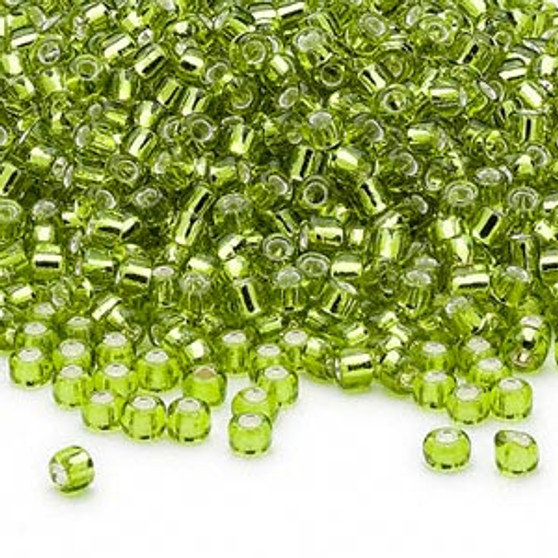 Seed bead, Dyna-Mites™, glass, silver-lined translucent light green, #8 round. Sold per 40-gram pkg.