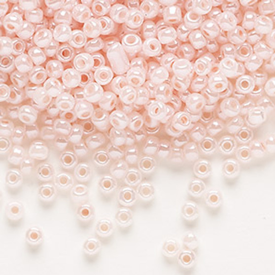 Seed bead, Dyna-Mites™, glass, opaque ceylon pastel pink, #8 round. Sold per 40-gram pkg.