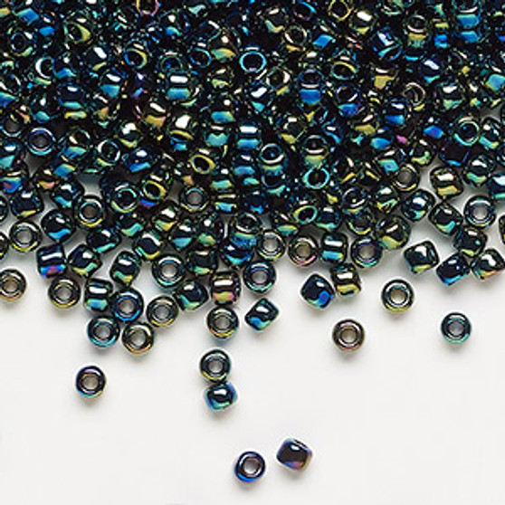 Seed bead, Dyna-Mites™, glass, transparent rainbow multi-iris, #8 round. Sold per 40-gram pkg.