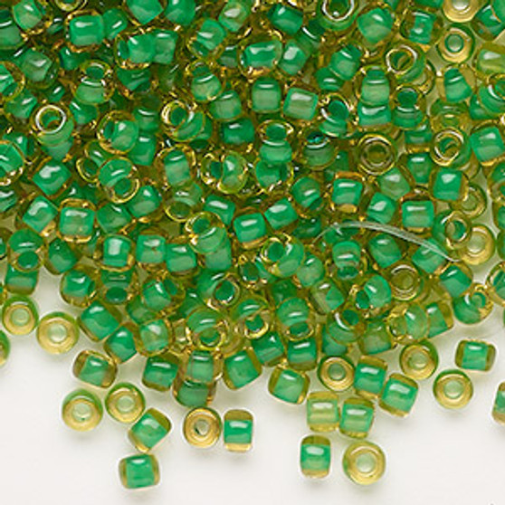 Seed bead, Dyna-Mites™, glass, translucent inside color lime, #6 round. Sold per 40-gram pkg.