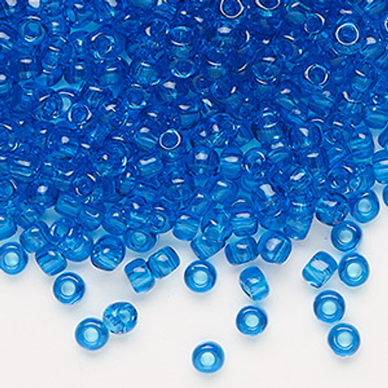 Seed bead, Dyna-Mites™, glass, transparent turquoise blue, #6 round. Sold per 40-gram pkg.