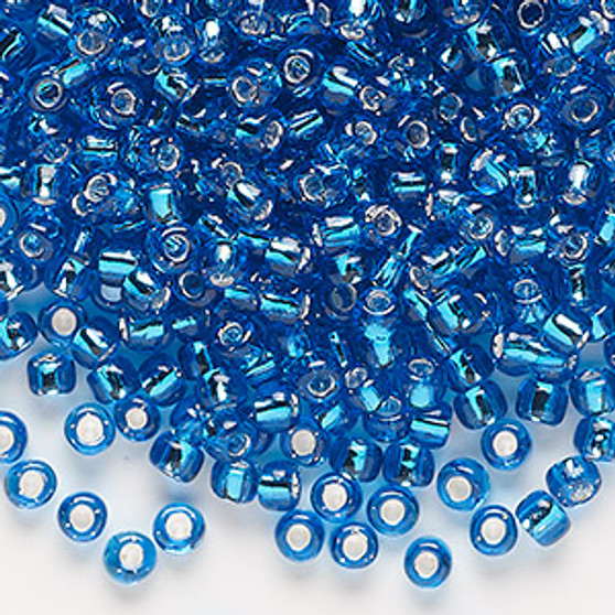 Seed bead, Dyna-Mites™, glass, silver-lined translucent turquoise blue, #6 round. Sold per 40-gram pkg.