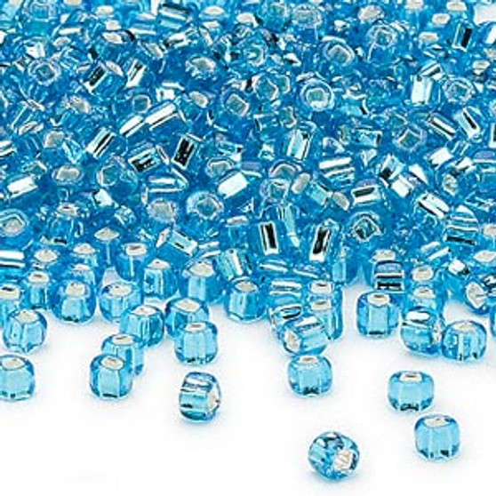 Seed bead, Dyna-Mites™, glass, silver-lined translucent aqua, #6 round with square hole. Sold per 40-gram pkg.