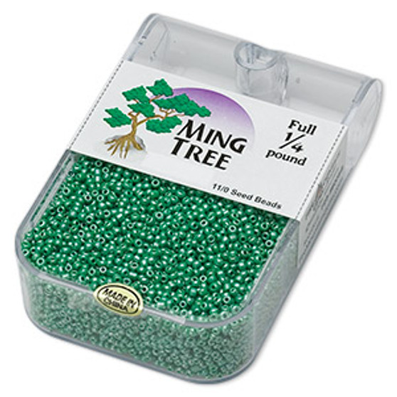 Seed bead, Ming Tree™, glass, opaque luster green, #11 round. Sold per 1/4 pound pkg.