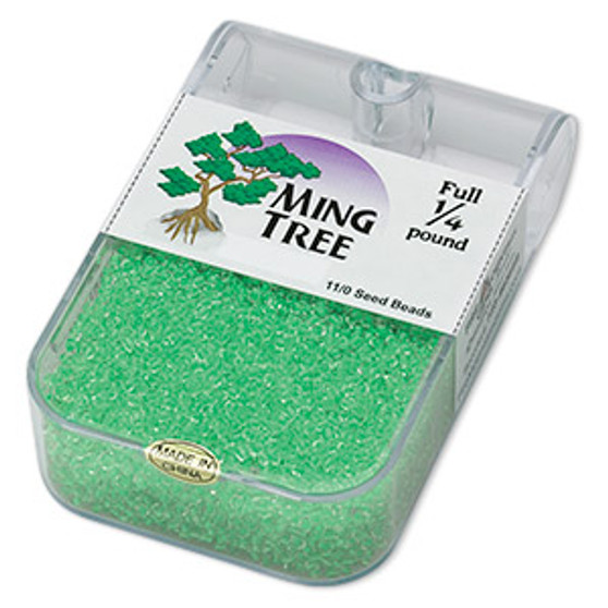 Seed bead, Ming Tree™, glass, transparent color-lined bright green, #11 round. Sold per 1/4 pound pkg.