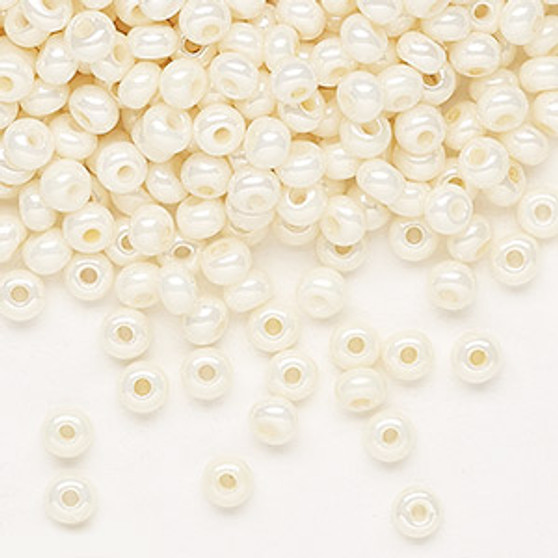 Seed bead, Preciosa Ornela, Czech glass, opaque dark shell luster chalkwhite, #6 rocaille. Sold per 50-gram pkg.