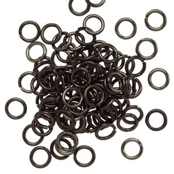 LAST STOCK: Jump ring, anodized aluminum, black, 5.5mm round, 3.5mm inside diameter, 18 gauge. Sold per pkg of 100.