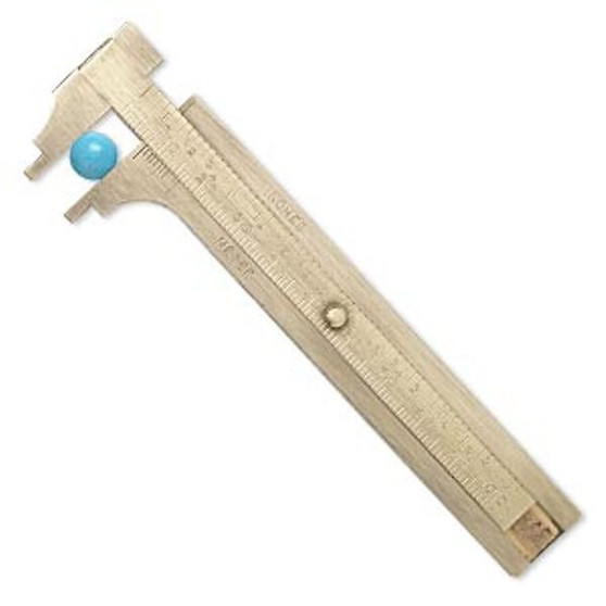 Slide gauge, brass, 4-5/8 x 1-5/16 inches.