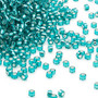 Seed bead, Dyna-Mites™, glass, silver-lined transparent teal, #11 round. Sold per 40-gram pkg.