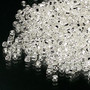 Seed bead, Dyna-Mites™, glass, silver-lined translucent clear, #11 round with square hole. Sold per 40-gram pkg.