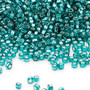 Seed bead, Dyna-Mites™, glass, silver-lined translucent teal blue, #11 round with square hole. Sold per 40-gram pkg.