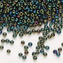 Seed bead, Preciosa Ornela, Czech glass, opaque green iris black, #8 rocaille. Sold per 50-gram pkg.