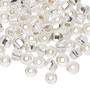 Seed bead, Preciosa Ornela, Czech glass, transparent silver-lined clear, #2 rocaille with square hole. Sold per 50-gram pkg.