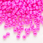Seed bead, Preciosa Ornela, Czech glass, opaque luster dyed pink, #6 rocaille. Sold per 50-gram pkg.