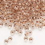 Seed bead, Preciosa Ornela, Czech glass, transparent copper-lined clear, #6 rocaille. Sold per 50-gram pkg.