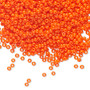 Seed bead, Preciosa Ornela, Czech glass, opaque dark orange (93140), #11 rocaille. Sold per 50-gram pkg.