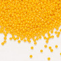 Seed bead, Preciosa Ornela, Czech glass, opaque rainbow orange, #11 rocaille. Sold per 500-gram pkg.