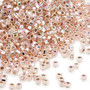Seed bead, Dyna-Mites™, glass, silver-lined translucent rainbow light pink, #11 round with square hole. Sold per 40-gram pkg.