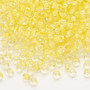 Seed bead, Dyna-Mites™, glass, translucent inside color light yellow, #6 round. Sold per 40-gram pkg.