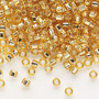 Seed bead, Dyna-Mites™, glass, silver-lined translucent medium gold, #6 round with square hole. Sold per 40-gram pkg.