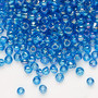 Seed bead, Dyna-Mites™, glass, transparent rainbow teal, #6 round. Sold per 40-gram pkg.