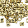 Bead mix, acrylic, opaque gold and black, 6mm cube with alphabet letters. Sold per pkg of 100.