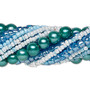 Bead assortment, glass, opaque to transparent light to dark aqua blue, 3x1mm-6mm round and irregular rondelle. Sold per pkg of (8) 14-inch strands, approximately 1,200 beads.