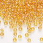 Seed bead, Preciosa Ornela, Czech glass, translucent rainbow topaz, #6 rocaille. Sold per 50-gram pkg.