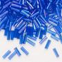 Bugle bead, Preciosa Ornela, Czech glass, translucent rainbow light blue, 1/4 inch. Sold per 50-gram pkg.