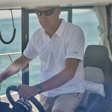 Men's UV Tec Polo - UV008-WHI01-LIFESTYLE-4.jpg