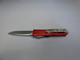 MICROTECH UTX85 SINGLE EDGE RED STONEWASH STANDARD SILVER HARDWARE BLADE OUT CLIP SIDE