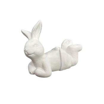 17603A584 White Bunny Lounging On Tummy