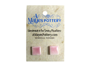 medium pink square stud pottery earrings on white background medium pink square stud pottery earrings on white background