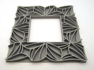 A Large Flower Petals stained glass texture frame clay pottery stamp. A Large Flower Petals stained glass texture frame clay pottery stamp.