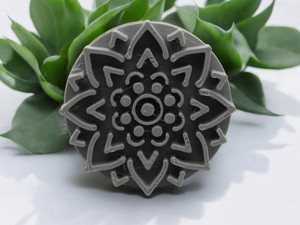 An accent (1) mandala texture clay pottery stamp. With succulent plants on marble look background. An accent (1) mandala texture clay pottery stamp. With succulent plants on marble look background.