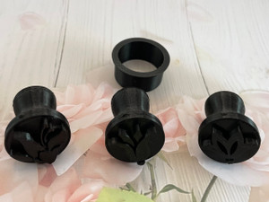 Abstract flower pottery clay stamps set 1, includes 3 unique flower stamps with bonus cutter. On a painted flower background. Abstract flower pottery clay stamps set 1, includes 3 unique flower stamps with bonus cutter. On a painted flower background.