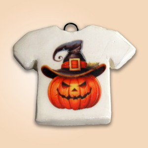 A Handmade Ceramic Tshirt Shaped Halloween Jackolantern in a Witches hat pendant. A Handmade Ceramic Tshirt Shaped Halloween Jackolantern in a Witches hat pendant.