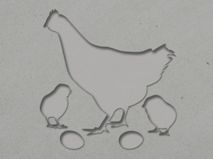 A solid clay imprint of a Mother Hen and Baby Chicks Clay Pottery Stamp.