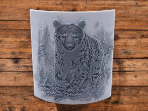 A texture image clay pottery stamp featuring a Bear in the Woods. With a wood look background. A texture image clay pottery stamp featuring a Bear in the Woods. With a wood look background.