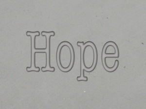 A clay imprint of a "Hope" mug Clay stamp for slab handbuild pottery. A clay imprint of a "Hope" mug clay stamp for slab handbuild pottery. A clay imprint of a "Hope" mug Clay stamp for slab handbuild pottery. A clay imprint of a "Hope" mug clay stamp for slab handbuild pottery.