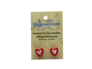 A set of Handmade Red outlined White heart ceramic post earrings. On an A Mayes card. A set of handmade red outlined white heart ceramic  post earrings. A set of Handmade Red outlined White heart ceramic post earrings. On an A Mayes card. A set of handmade red outlined white heart ceramic  post earrings.