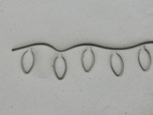 A clay imprint of Christmas Lights border clay stamp for handbuild pottery. A clay imprint of Christmas Lights Border clay stamp for handbuild pottery. A clay imprint of Christmas Lights border clay stamp for handbuild pottery. A clay imprint of Christmas Lights Border clay stamp for handbuild pottery.