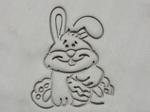 A Clay imprint of an Easter Bunny Mug Clay Stamp for Slab handbuild Pottery. A clay imprint of an Easter Bunny mug clay stamp for slab handbuild pottery. A Clay imprint of an Easter Bunny Mug Clay Stamp for Slab handbuild Pottery. A clay imprint of an Easter Bunny mug clay stamp for slab handbuild pottery.
