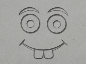 A clay imprint of A silly face with two front teeth Pottery Clay Stamp for handbuild slab mug stamp. A clay imprint of a silly face with two front teeth pottery clay stamp for handbuild slab mug stamp. A clay imprint of A silly face with two front teeth Pottery Clay Stamp for handbuild slab mug stamp. A clay imprint of a silly face with two front teeth pottery clay stamp for handbuild slab mug stamp.