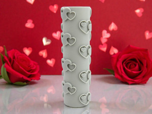 Valentines Overlapping Heart Texture Roller on table with rose petals