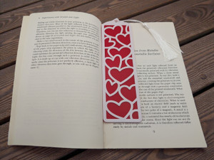 Bookmark with tassel laid in book